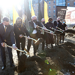 A group of people with shovels breaking the ground for Purdue University's Hagle hall